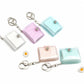 Blank mini photo album keychains in white, pink, blue and beige marbled glitter covers