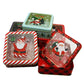 Six printed Christmas tin boxes with window lids arranged on a white background