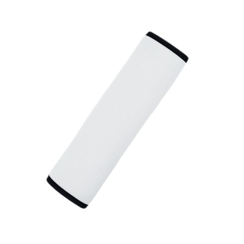 Blank white polyester seat belt cover standing upright, showing the black velcro edges